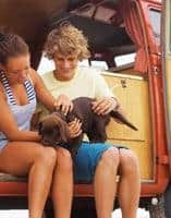 young people with a dog